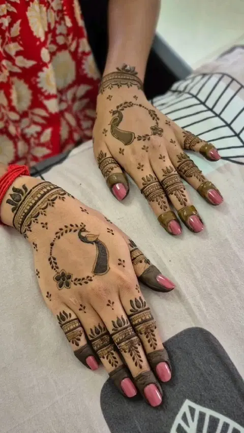 minimal simple deity back hand mehndi design
