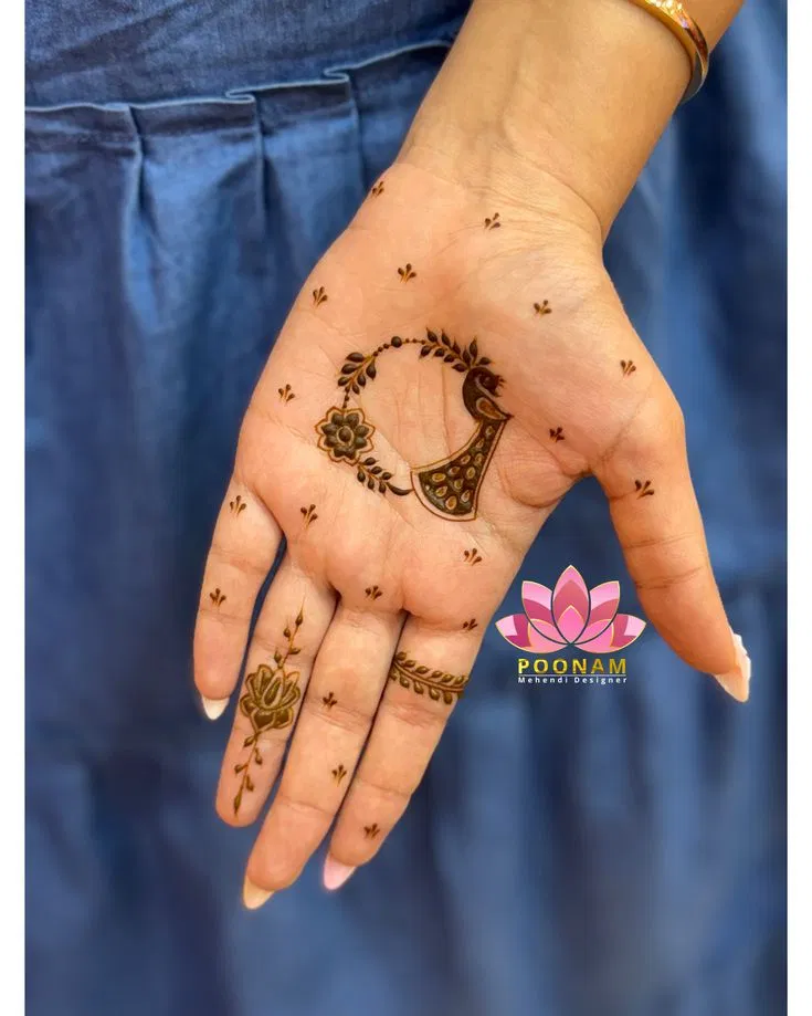 Aesthetic Minimal Finger Mehndi Design with Gol Tikki, Moon and Peacock