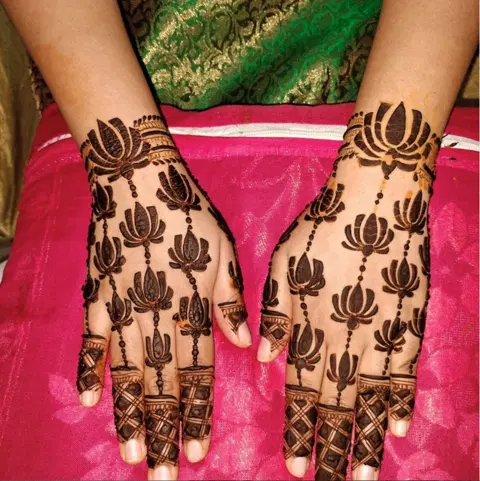 minimal simple flower back hand mehndi design