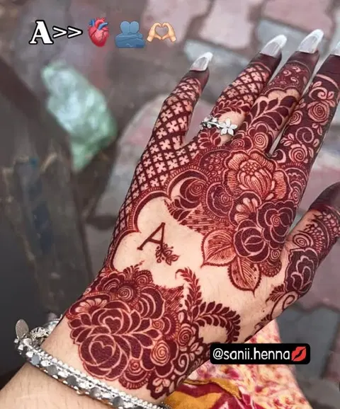bridal stylish name back hand mehndi design