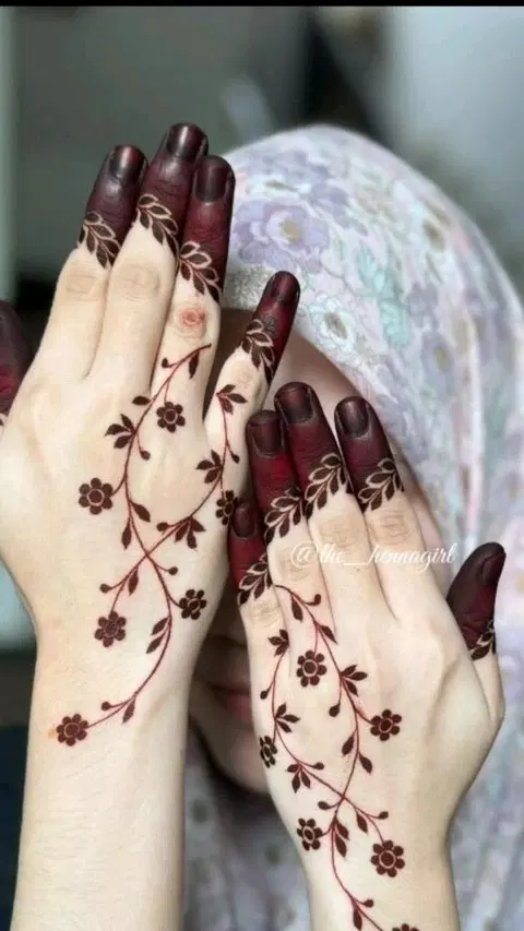 aesthetic minimal bel back hand mehndi design