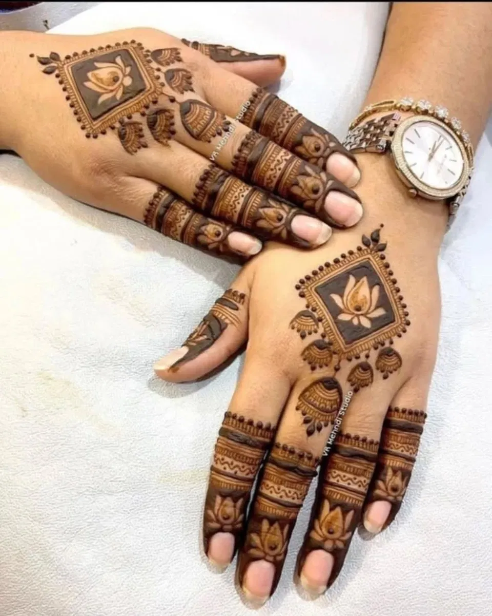 Bridal Simple Back Hand Mehndi Design with Gol Tikki, Deity and Jaal