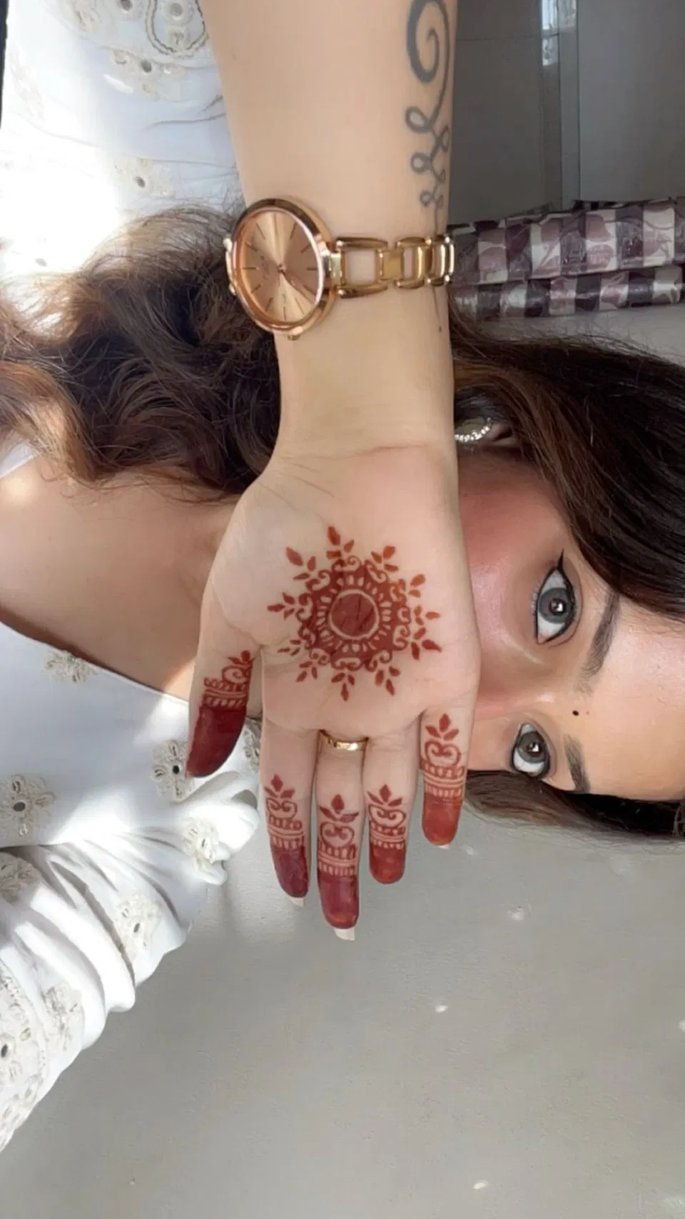 Aesthetic Indian Arm Mehndi Design with Gol Tikki and Flowers