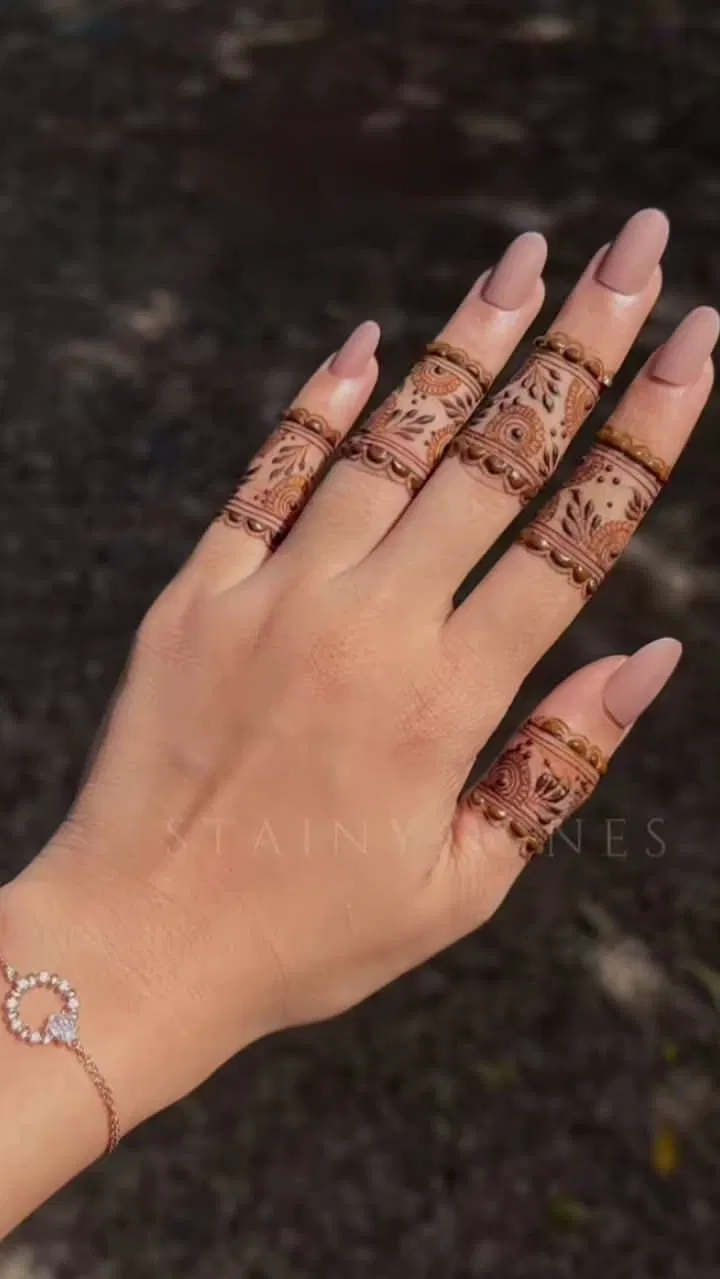 Aesthetic Minimal Finger Mehndi Design with Lotus and Moon
