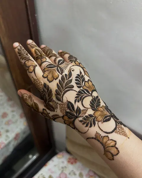 aesthetic arabic flower back hand mehndi design