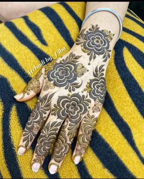 aesthetic arabic flower back hand mehndi design