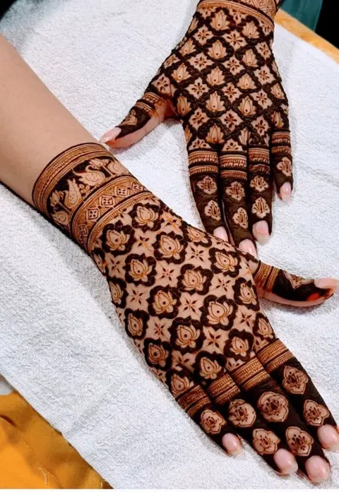 aesthetic bridal jaal back hand mehndi design