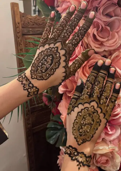 aesthetic indian circle back hand mehndi design