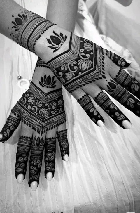 aesthetic bridal lotus back hand mehndi design