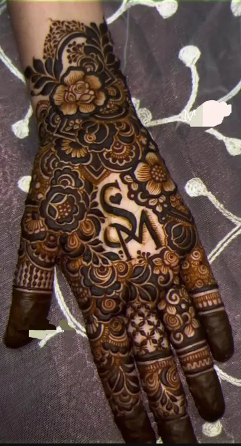 arabic bridal name back hand mehndi design