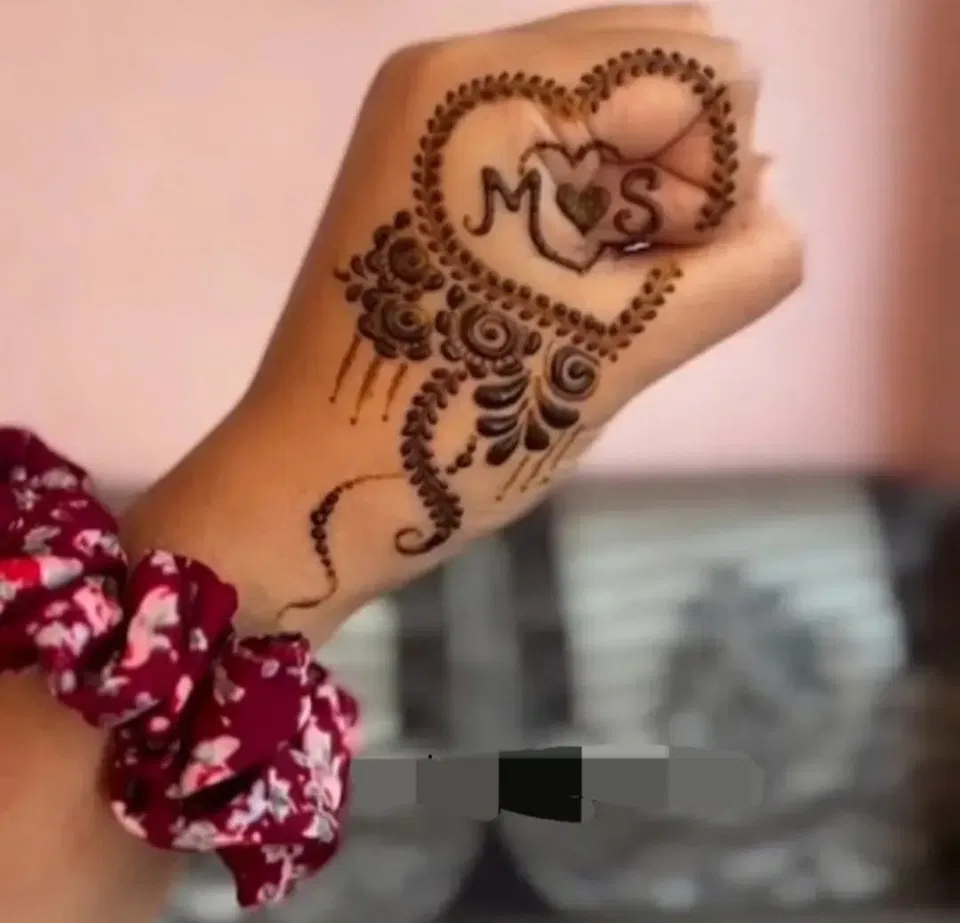 Simple Mehndi Design with Figures and Hearts