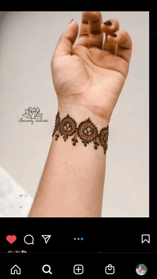 Arabic Simple Back Hand Mehndi Design with Gol Tikki and Hearts