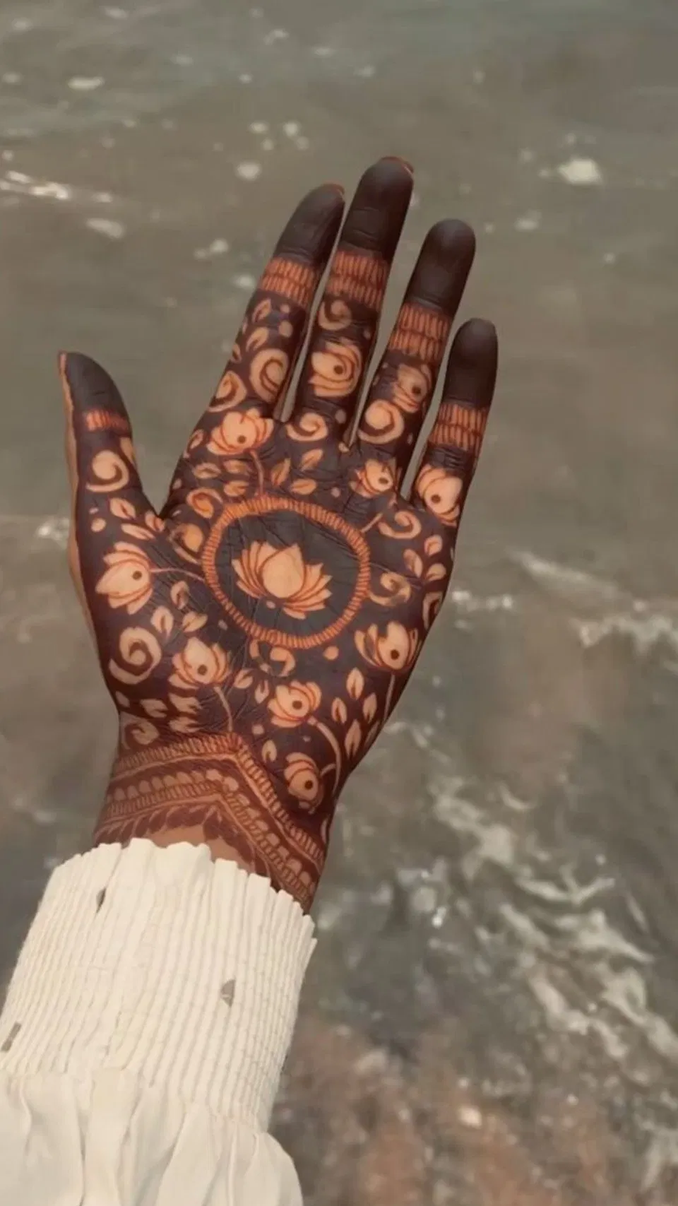 Stylish Back Hand Mehndi Design with Gol Tikki and Lotus