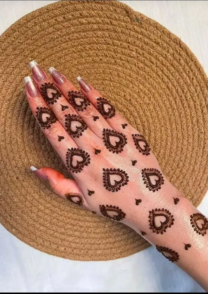 Simple Arm Mehndi Design with Hearts