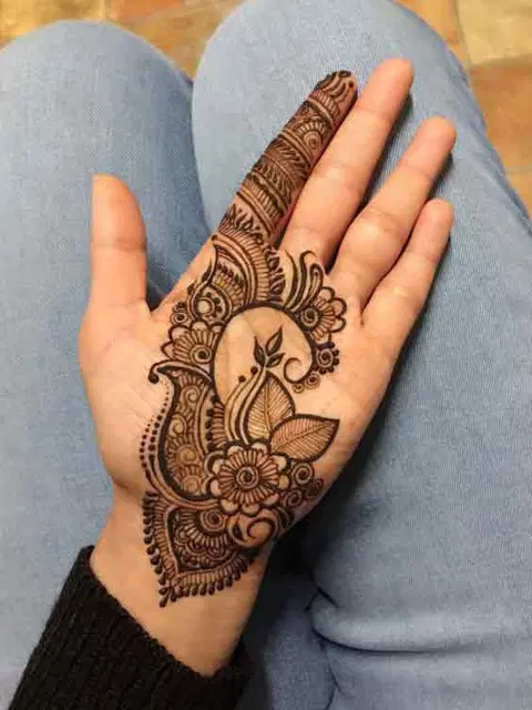 aesthetic arabic peacock back hand mehndi design