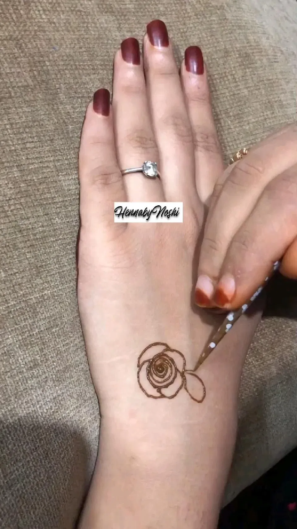 Simple Stylish Back Hand Mehndi Design with Flowers and Hearts