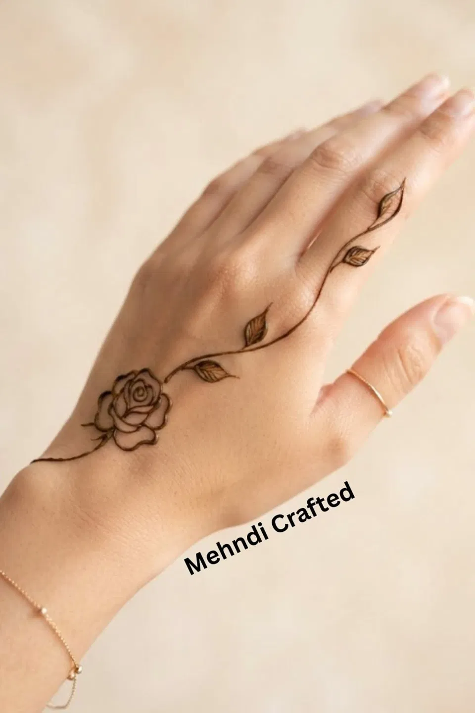 Arabic Simple Back Hand Mehndi Design with Bel, Gol Tikki and Flowers
