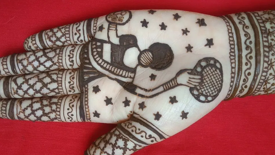 Arm Mehndi Design with Gol Tikki and Figures for Karwa Chauth