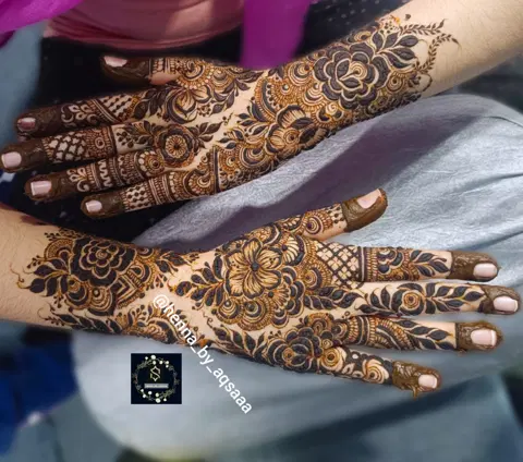 aesthetic bridal circle back hand mehndi design
