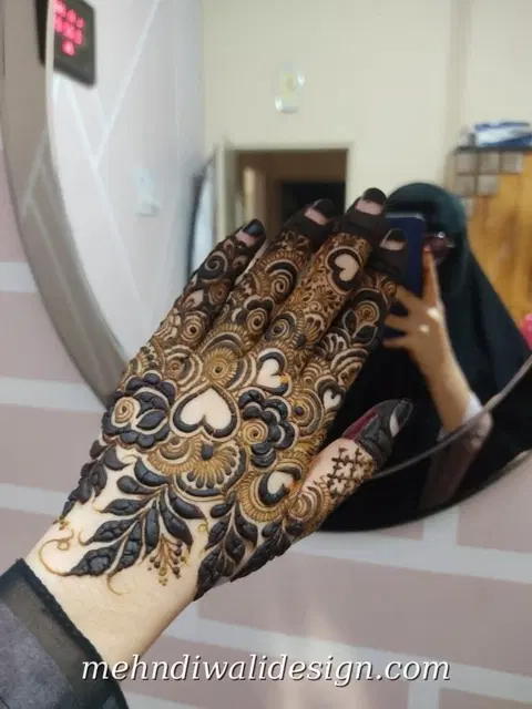 aesthetic bridal heart back hand mehndi design