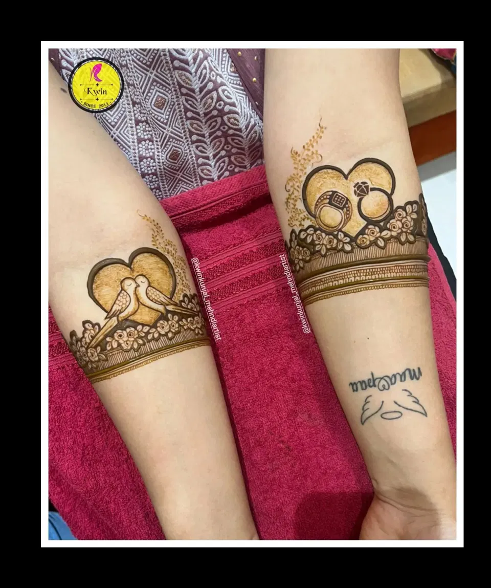 Bridal Arm Mehndi Design with Figures, Hearts and Moon for Engagement