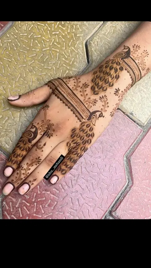 bridal simple deity arm mehndi design
