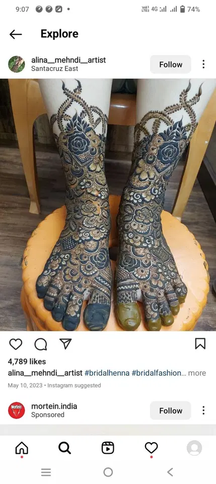 bridal indian figure back hand mehndi design