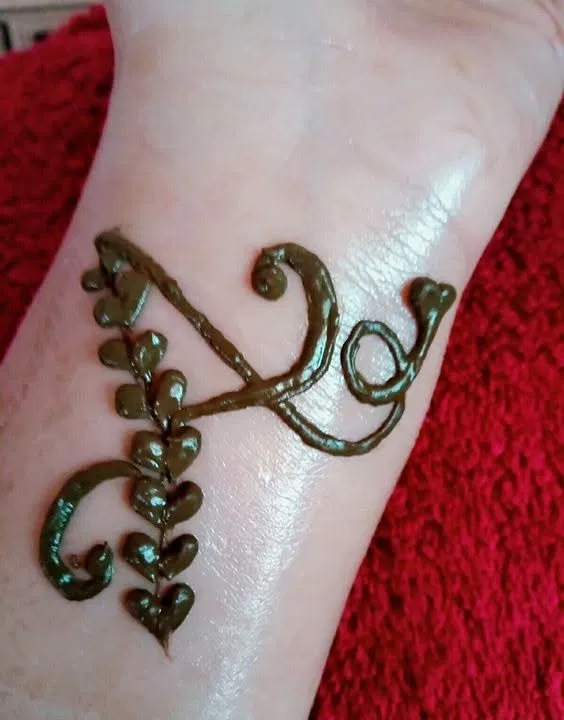 Arabic Simple Back Hand Mehndi Design with Hearts and Hidden Name (2)