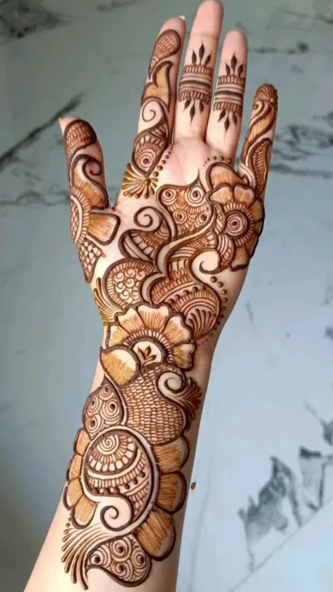 aesthetic arabic bel front hand mehndi design
