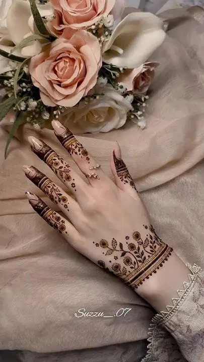 aesthetic simple flower back hand mehndi design