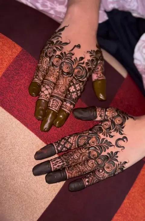 aesthetic bridal lotus back hand mehndi design