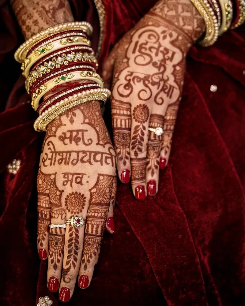 Bridal Dubai Back Hand Mehndi Design with Deity and Figures for Karwa Chauth