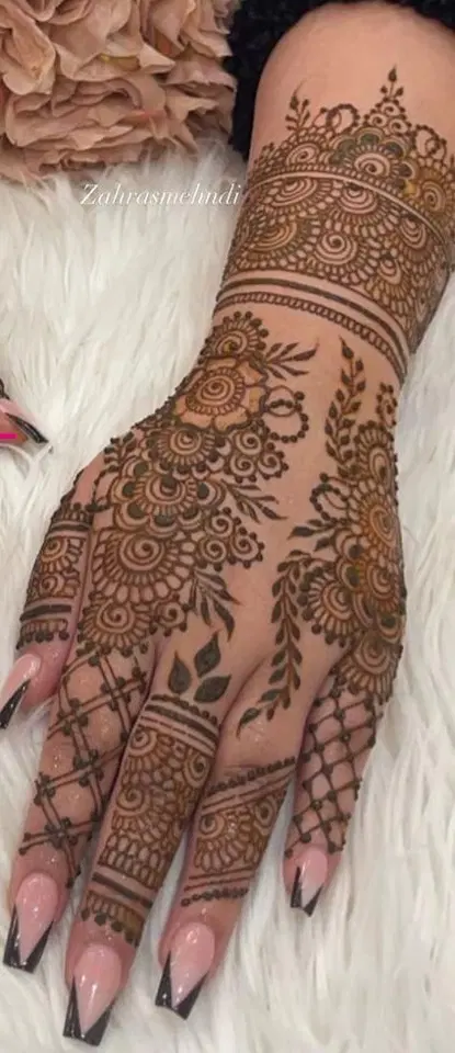 bridal simple lotus back hand mehndi design