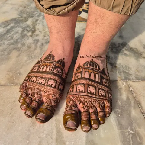 royal deity back hand mehndi design