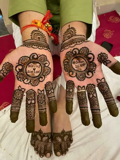 bridal royal circle back hand mehndi design