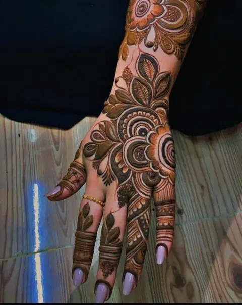aesthetic arabic flower back hand mehndi design