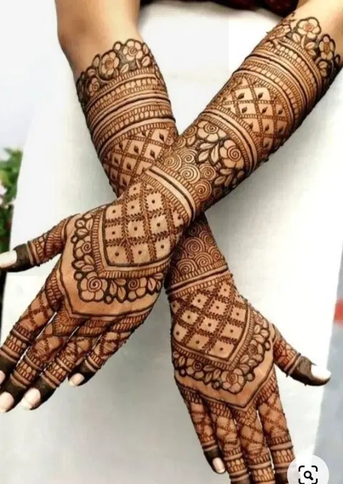 bridal royal figure back hand mehndi design