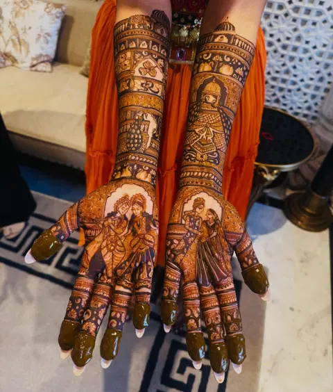 bridal figure back hand mehndi design
