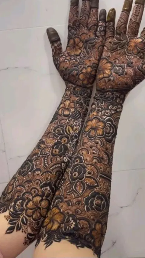 aesthetic bridal figure back hand mehndi design