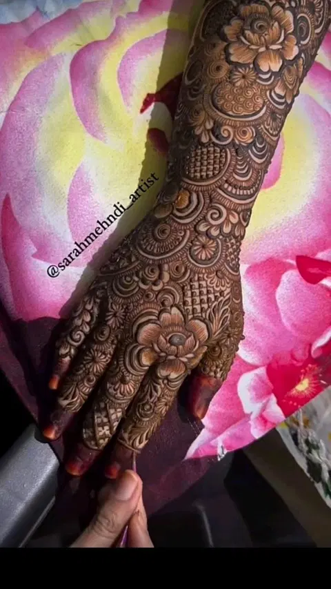aesthetic bridal flower back hand mehndi design