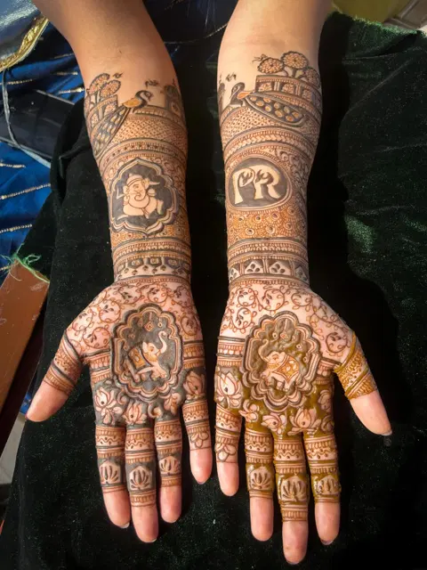 bridal figure front hand mehndi design