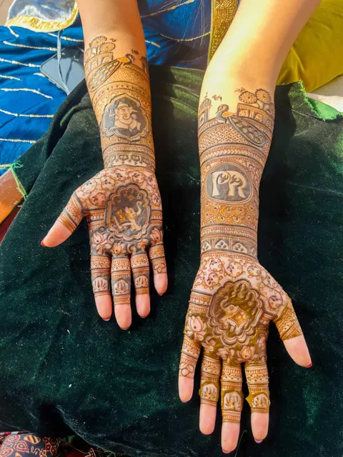 bridal figure front hand mehndi design