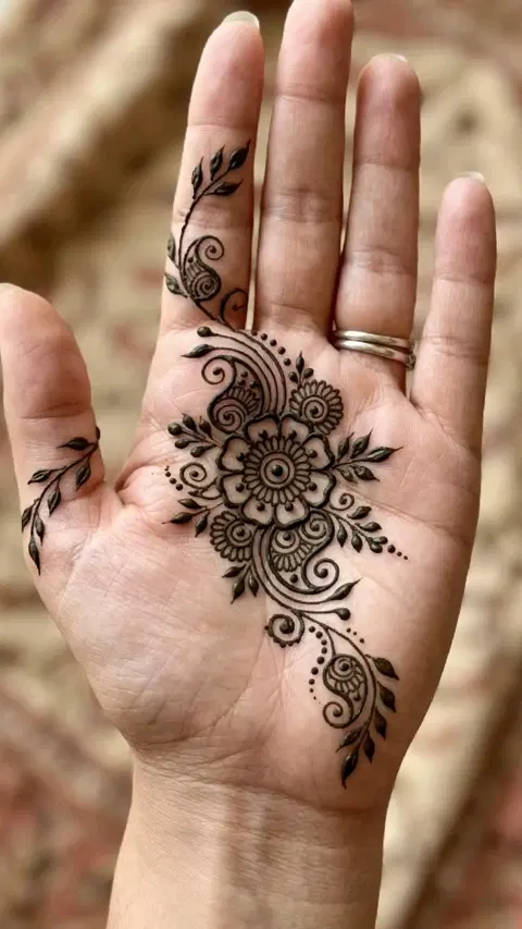 aesthetic arabic bel back hand mehndi design