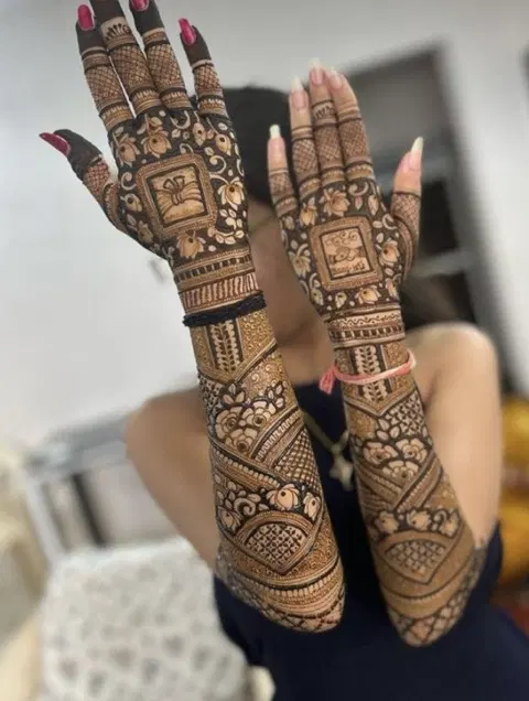 bridal stylish figure arm mehndi design