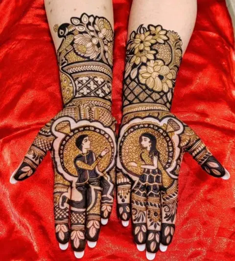 figure full hand mehndi design