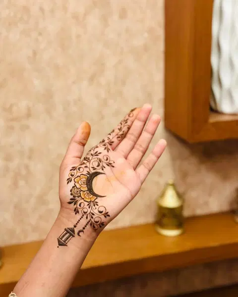 aesthetic simple moon finger mehndi design