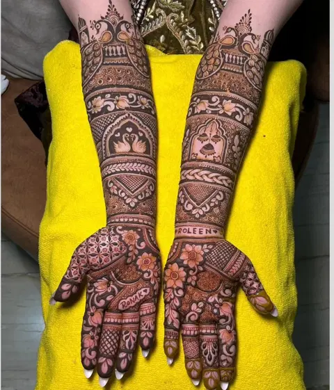 figure full hand mehndi design