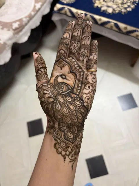 bridal indian peacock front hand mehndi design