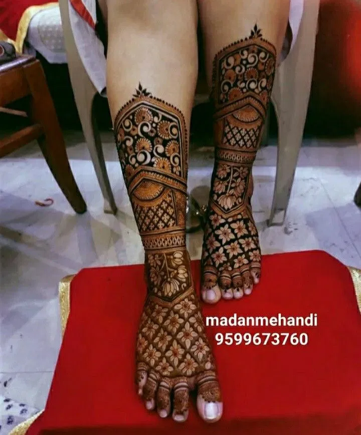 Bridal Stylish Back Hand Mehndi Design with Deity, Figures and Hearts