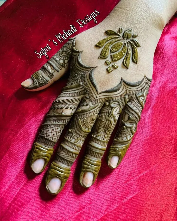 Simple Stylish Back Hand Mehndi Design with Gol Tikki and Lotus (2)